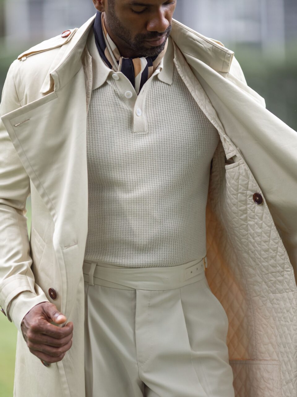 (product) Cream Cotton Trench Coat with Removable Lining, styled open over a textured knit sweater - custom suits nyc bespoke tailor midtown, noho