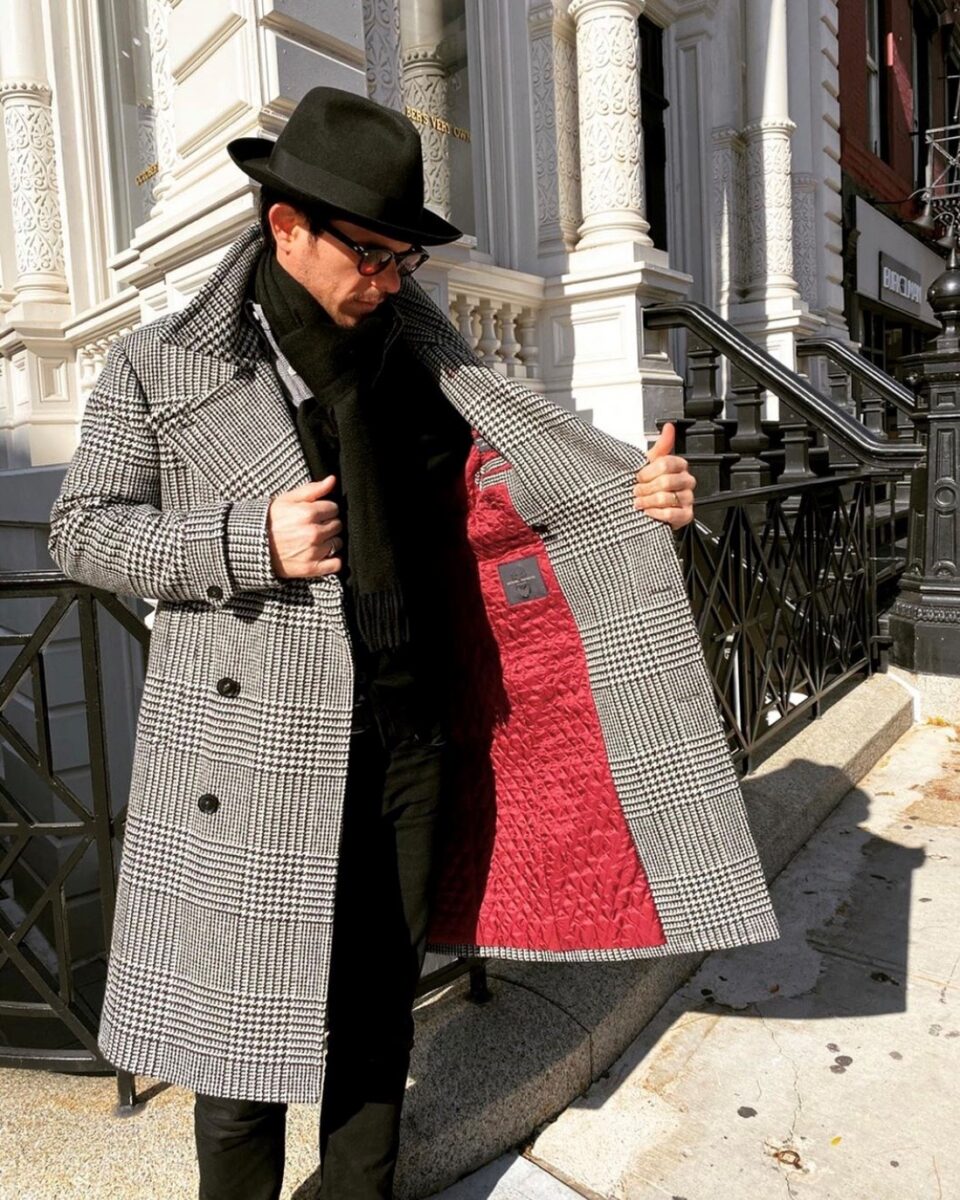 (product) Bespoke Black & White Glen Urquhart Great Coat with red lining displayed by a model - custom suits nyc bespoke tailor midtown, noho