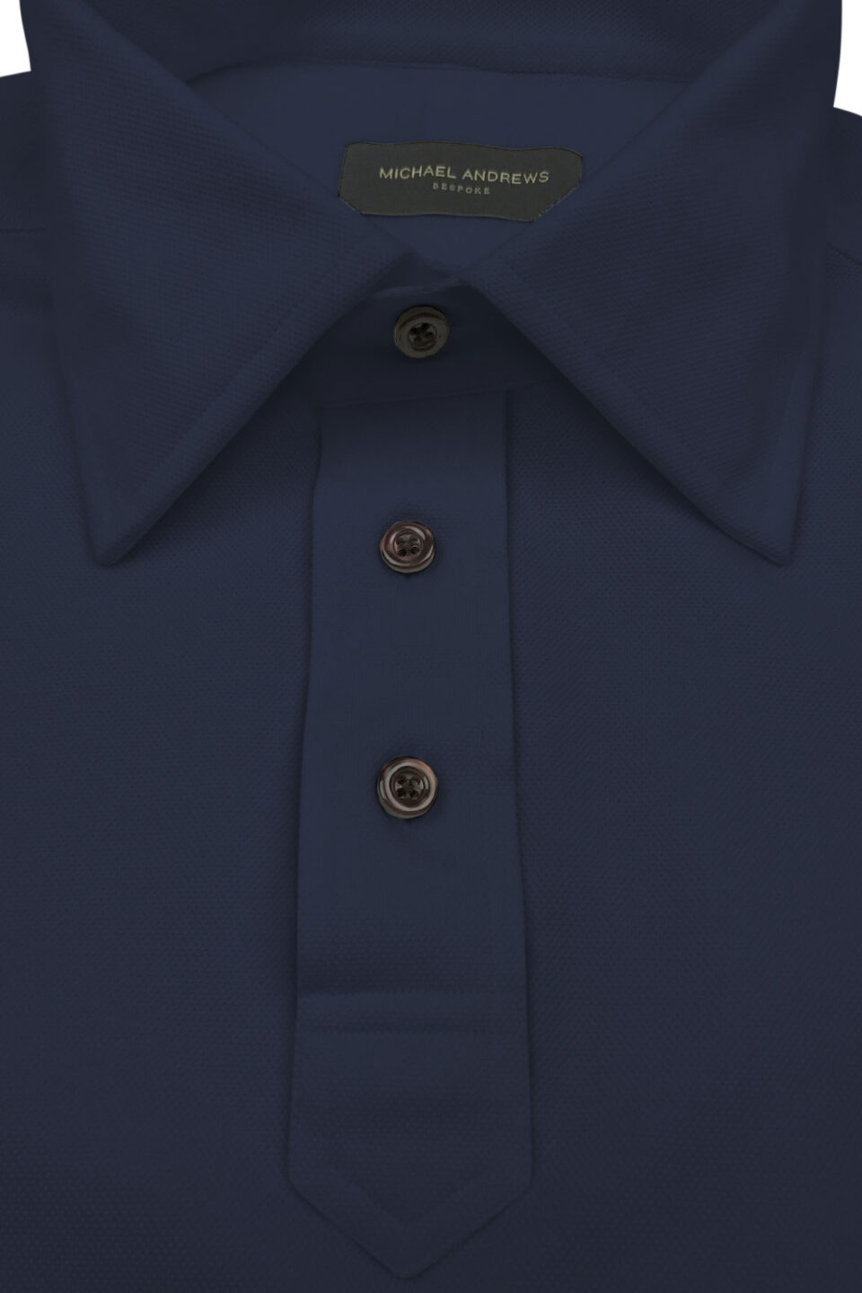 (product) Navy Blue Pique Polo Shirt, close-up of collar and buttons - custom suits nyc bespoke tailor midtown, noho