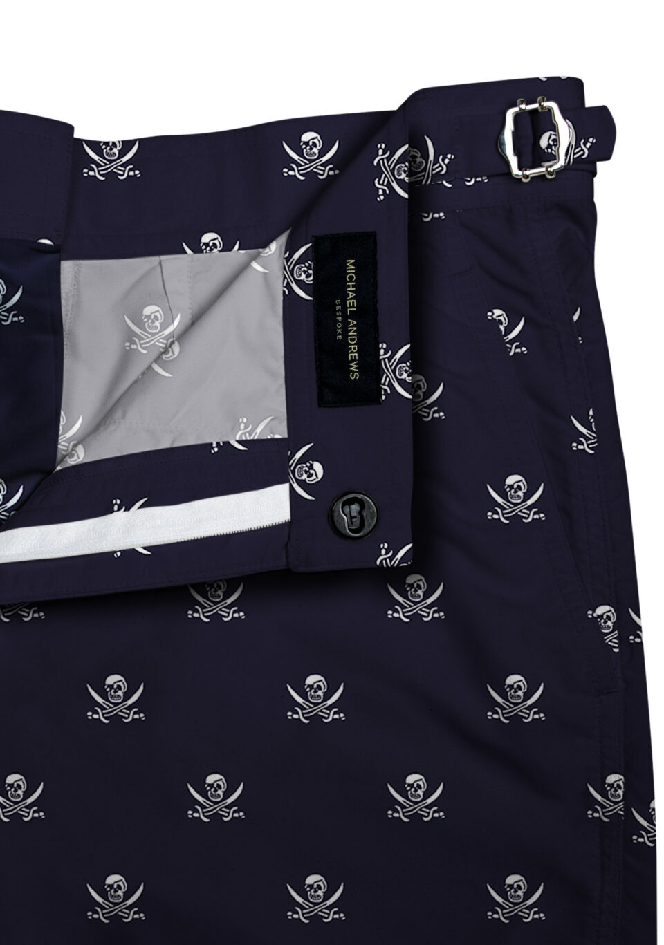 (product) Navy Jolly Roger Swim Swim Shorts, close-up view - custom suits nyc bespoke tailor midtown, noho