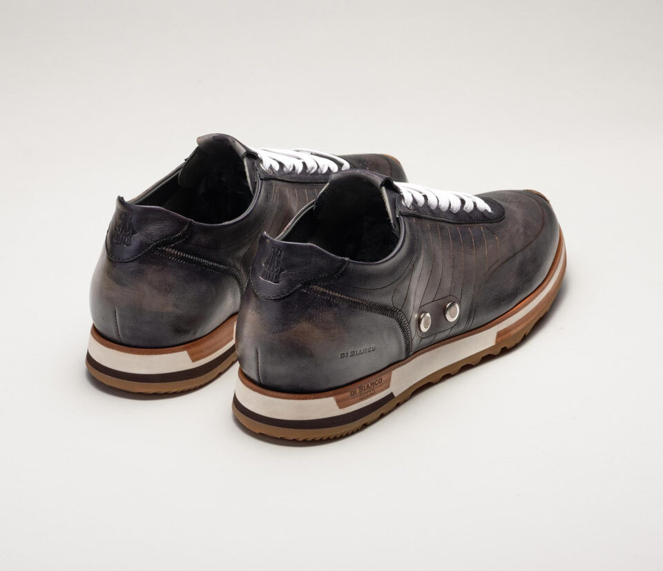 (product) Daytona Laser Fumo Dress Sneaker, Angled pair view - custom suits nyc bespoke tailor midtown, noho