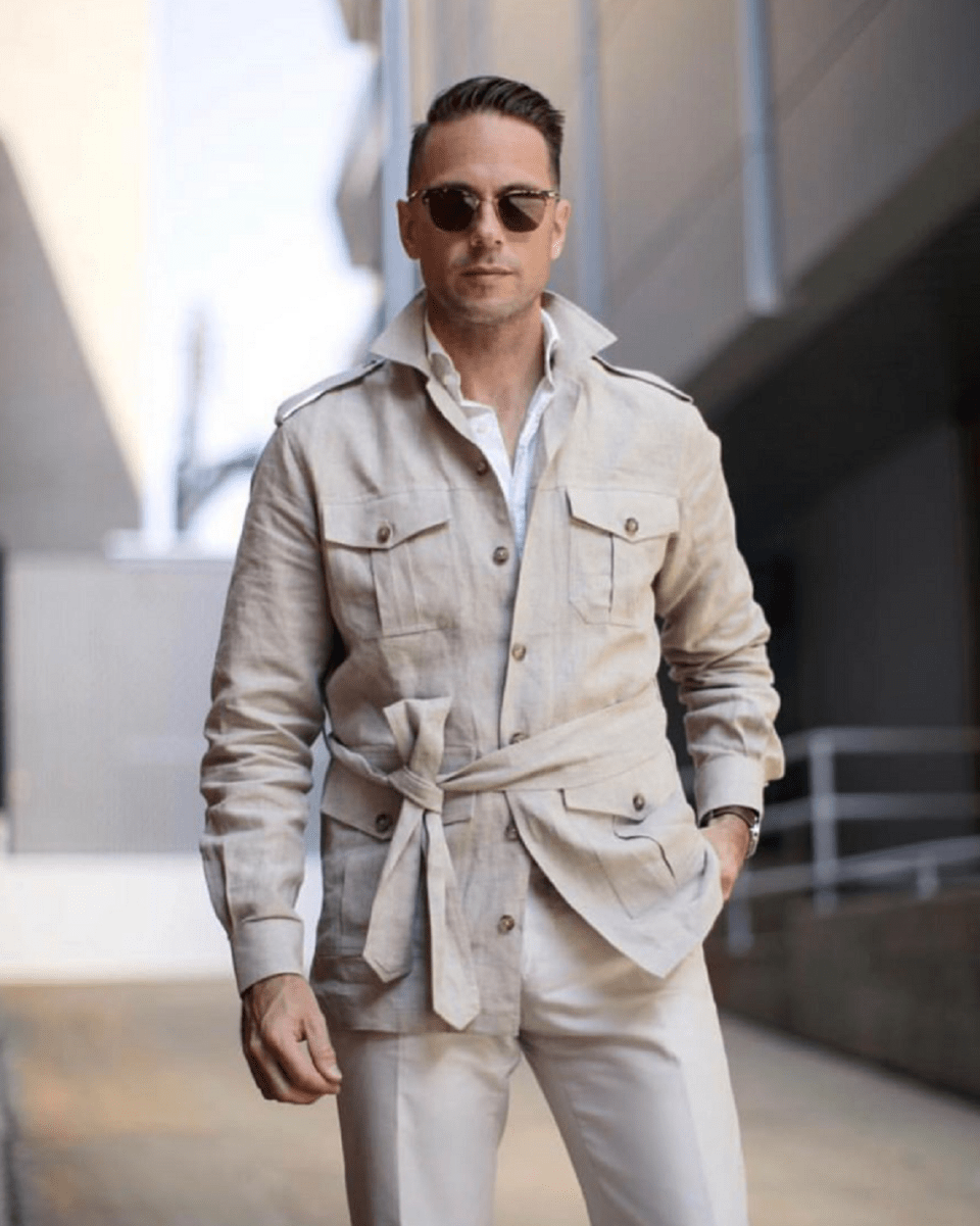 (product) Stone Solid Linen Safari Shirt Jacket, styled with sunglasses and a white shirt in an urban setting - custom suits nyc bespoke tailor midtown, noho
