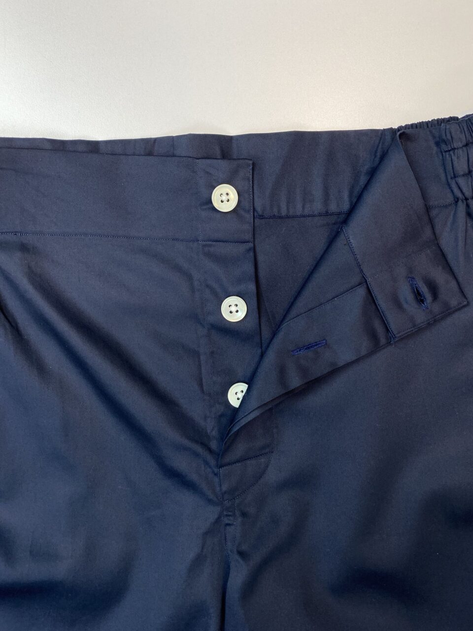 (product) Navy Pajama Shorts, close-up view - custom suits nyc bespoke tailor midtown, noho