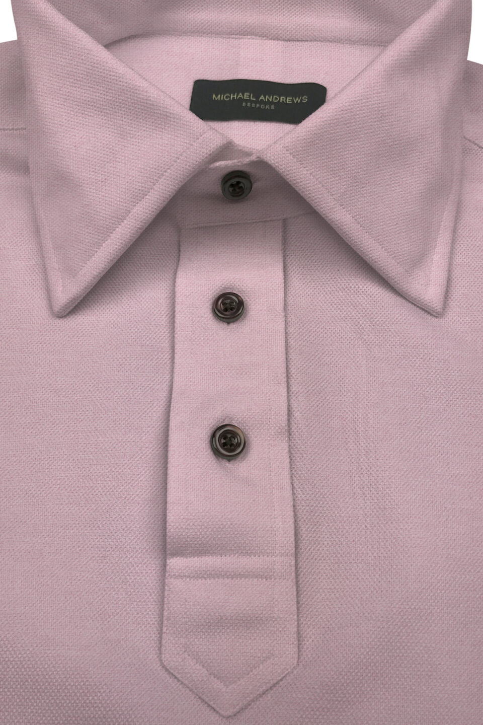 (product) Dark Millennial Pink Pique Short Sleeve Polo Shirt, showcasing collar and button details - custom suits nyc bespoke tailor midtown, noho
