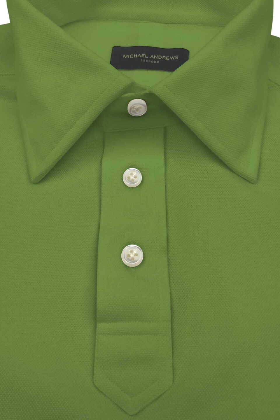 (product) Light Fern Green Pique Polo Shirt, close-up of collar and buttons - custom suits nyc bespoke tailor midtown, noho