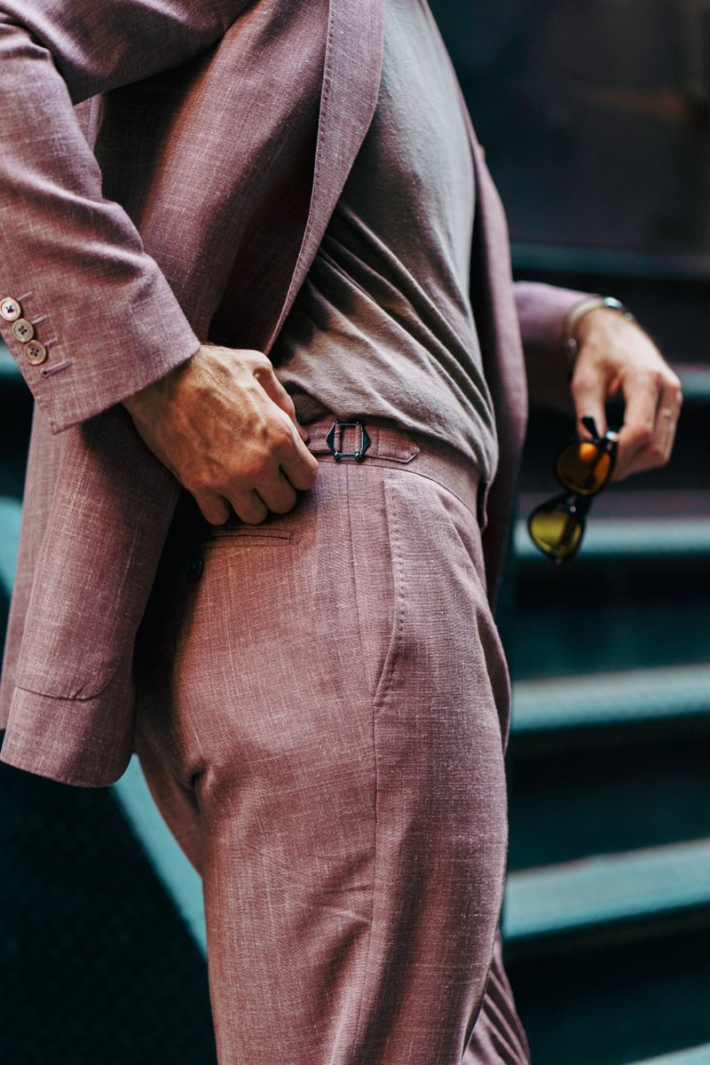 Close-up of a dusty rose blend suit with side adjuster detail, paired with a casual tee - custom suits nyc bespoke tailor midtown, noho