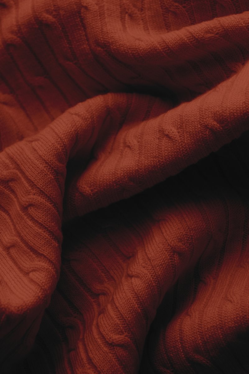 detailed view of a cable knit sweater - custom suits nyc bespoke tailor midtown, noho