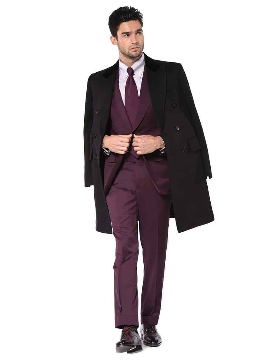(product) Aubergine Solid Bespoke Suit, styled with a black coat