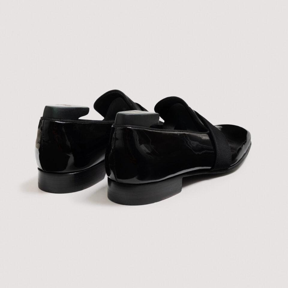(product) Galba Black Patent Formal Loafer, Back view of the pair
