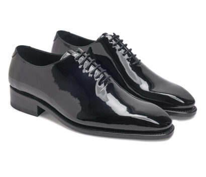 (product) Black Patent Leather Whole Cut Lace-Up, Side view of the pair