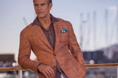 Model in an orange plaid Ariston blazer