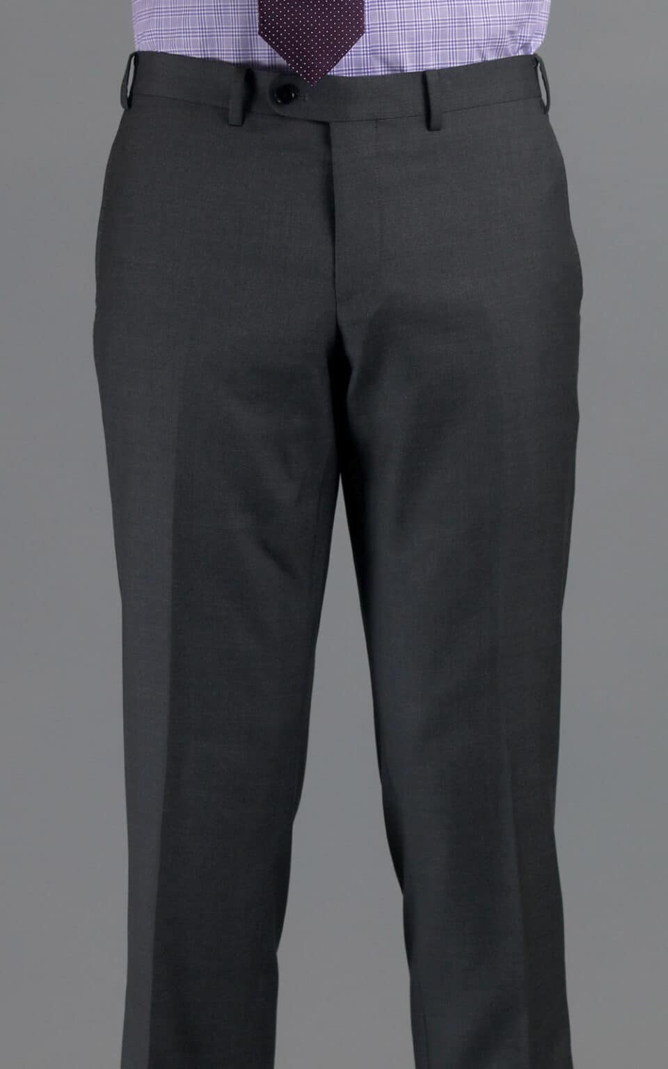 Front view of grey sharkskin MTM suit trousers styled with a lilac shirt