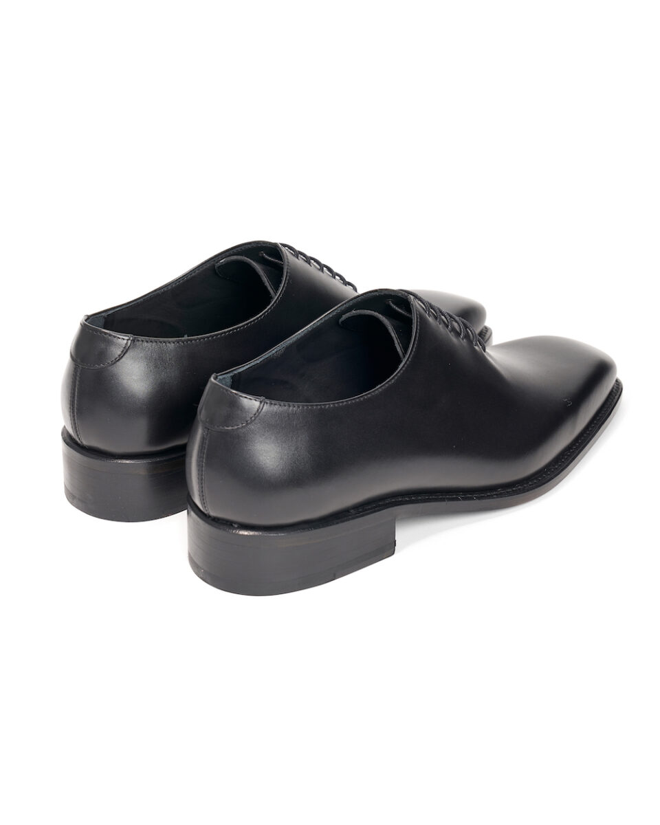 (product) Black Box Calf Whole Cut Lace-Up, Back view of the pair