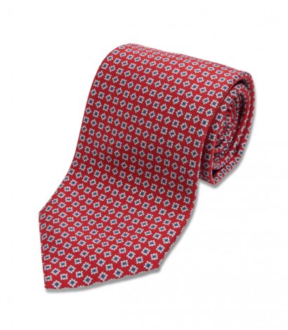 (product) Red with Blue & White Medallion Silk Necktie, Rolled