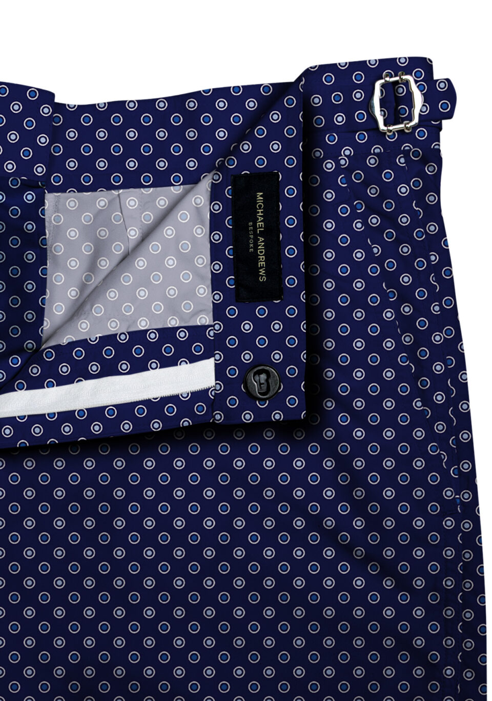 (product) Navy with Blue and Light Blue Dots Swim Shorts, close-up view