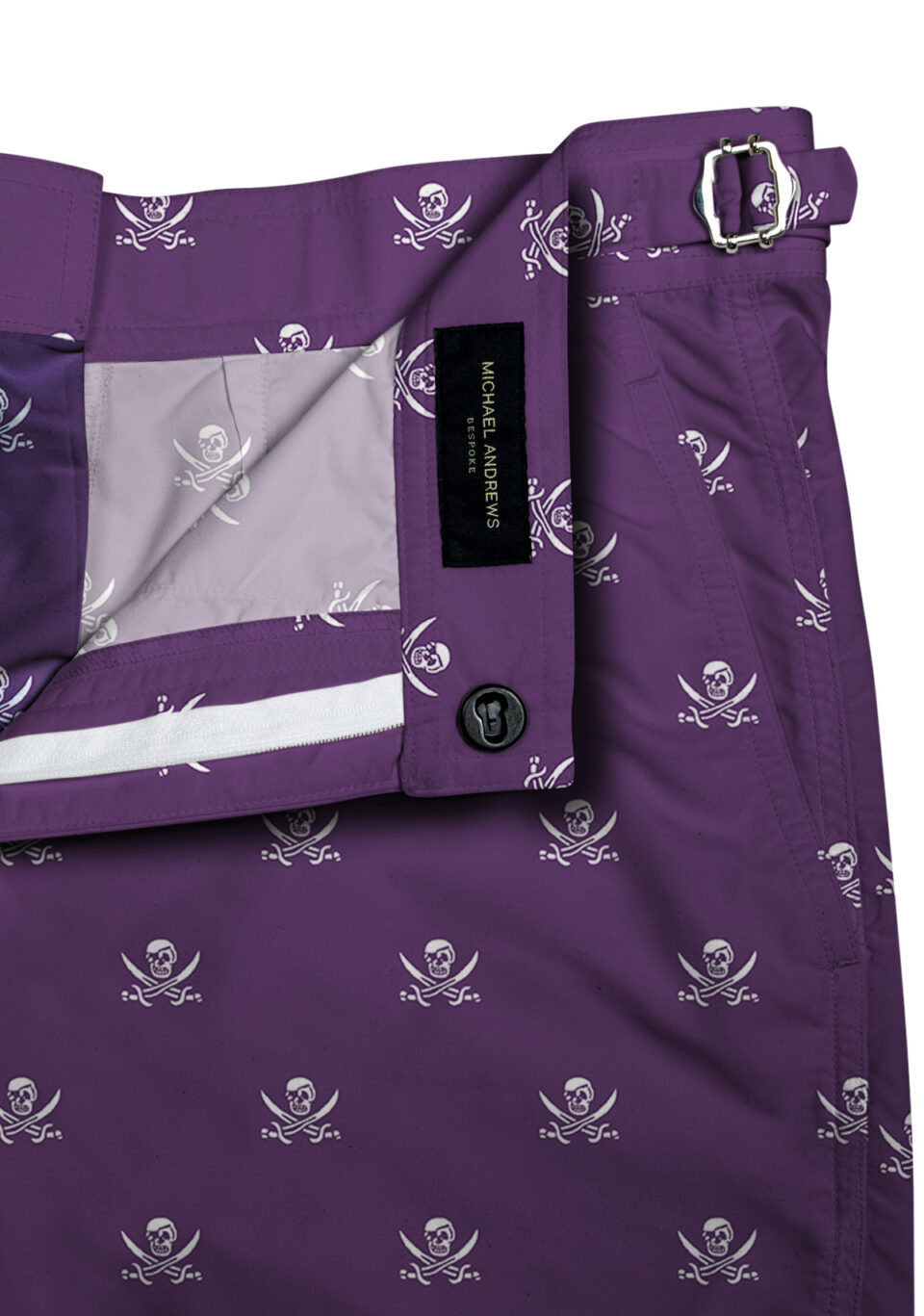 (product) Purple Jolly Roger Swim Swim Shorts, close-up view