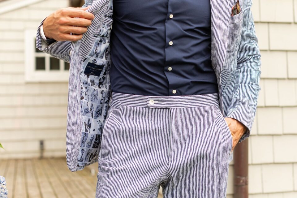 (product) Irregular Stripe Seersucker Suit, styled casually with hands in pockets