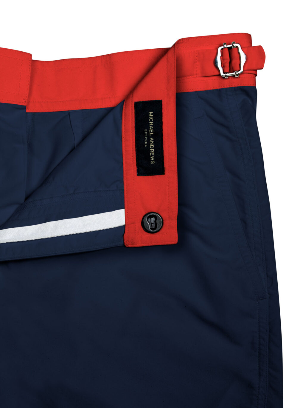 (product) Navy Blue Swim Shorts with Red Waistband, detailed view