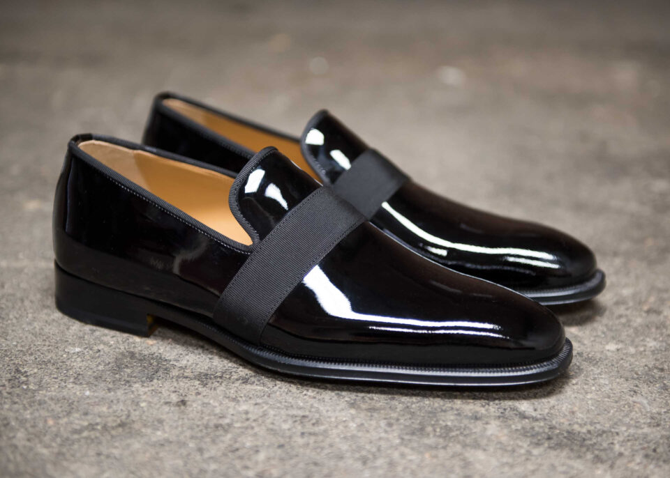 (product) Catania Black Patent Formal Loafer, Side view of the pair