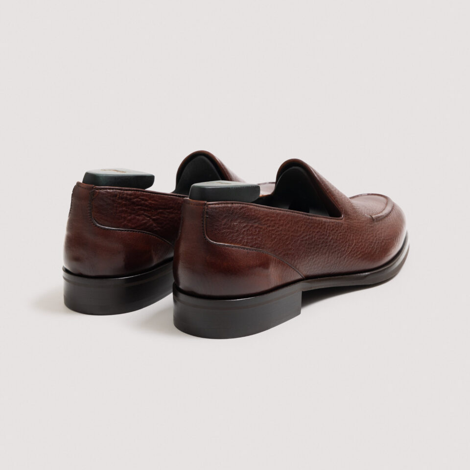 (product) Justin Loafer Pebble Grain Cadmio, Back view of the pair