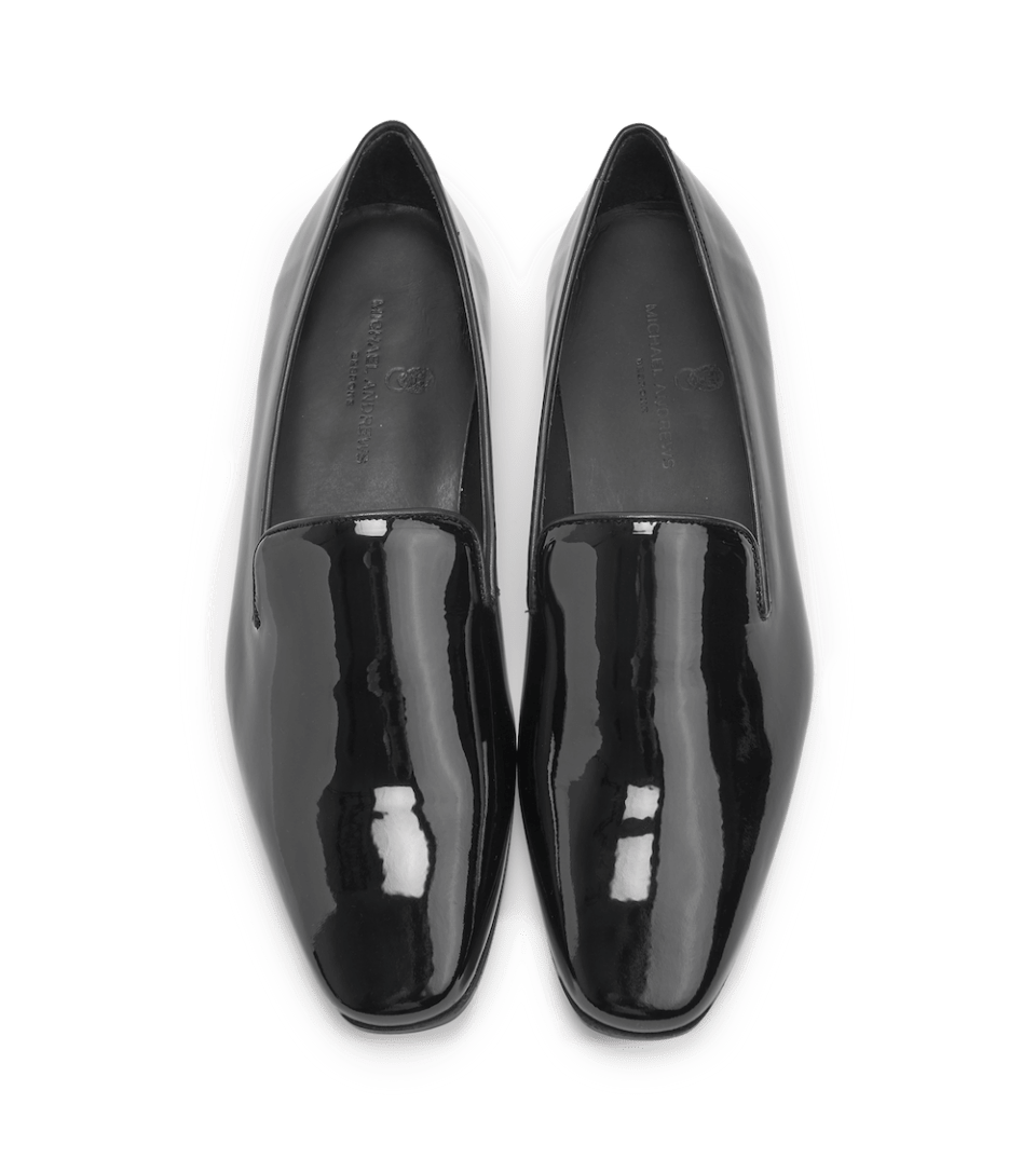 (product) Black Patent Slip-On Tuxedo Shoe, Top view of the pair