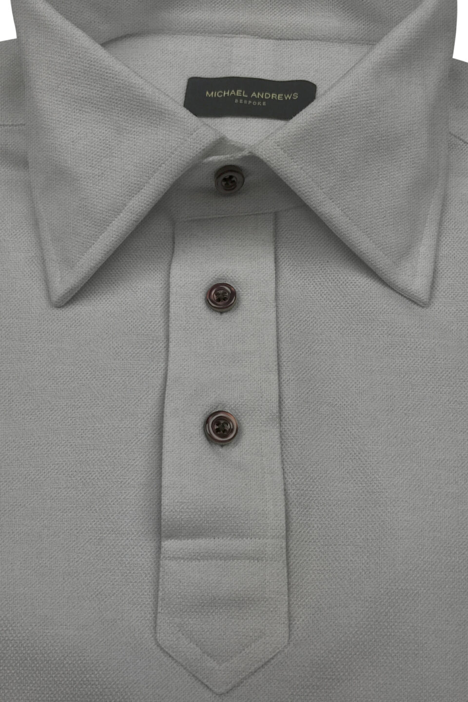 (product) Light Grey Pique Short Sleeve Polo Shirt, showcasing collar and button details