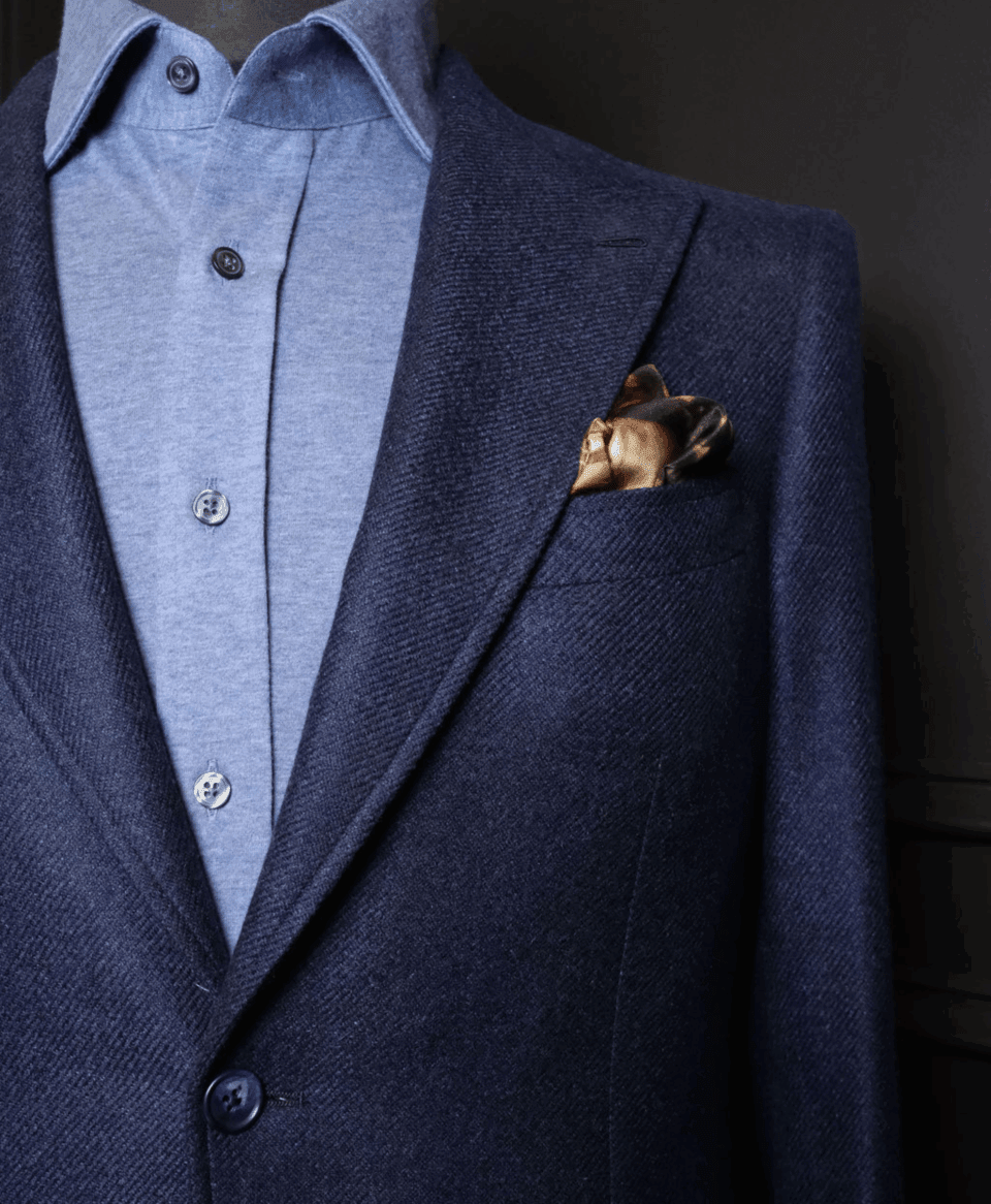 'The Fury of the Stag' Limited Edition Pocket Square styled in a chest pocket of navy textured jacket