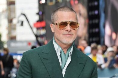 Brad Pitt wearing Green Suit for Formula 1 event