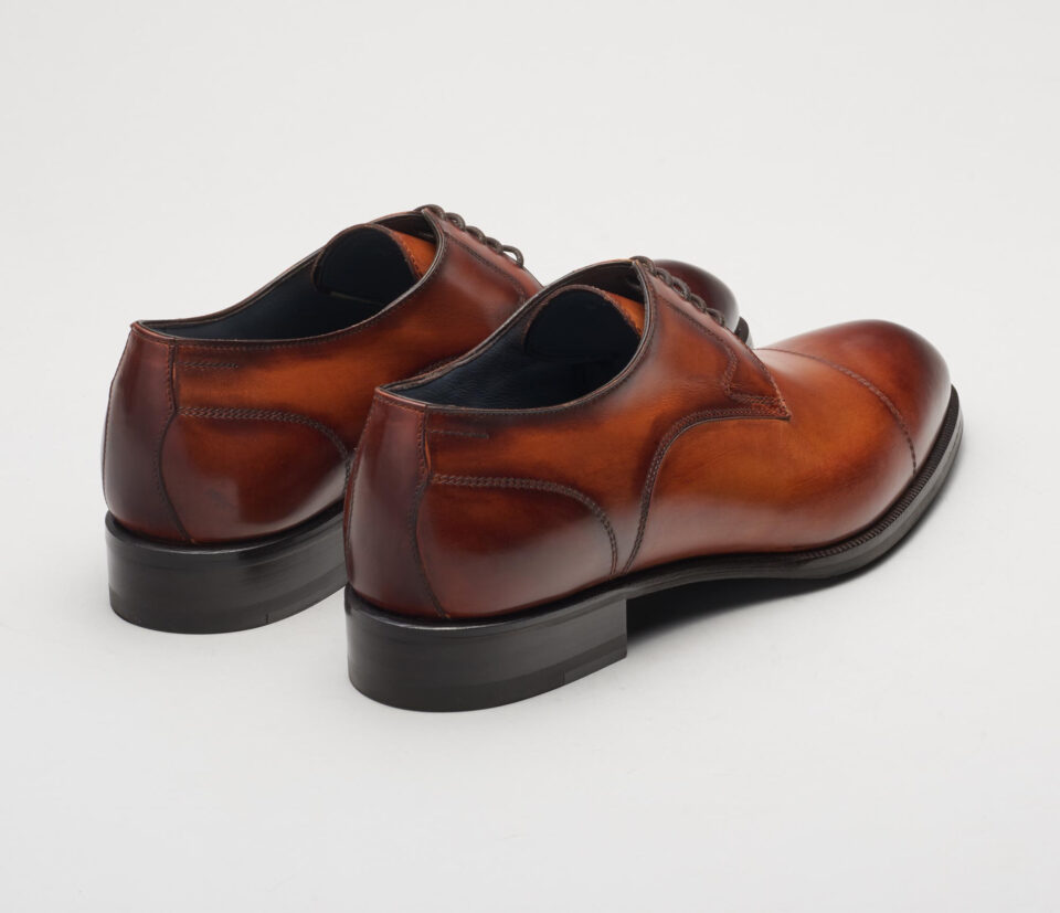 (product) Bergamo Oxford in Burnished Marmo Brown, Angled pair view - custom suits nyc bespoke tailor midtown, noho