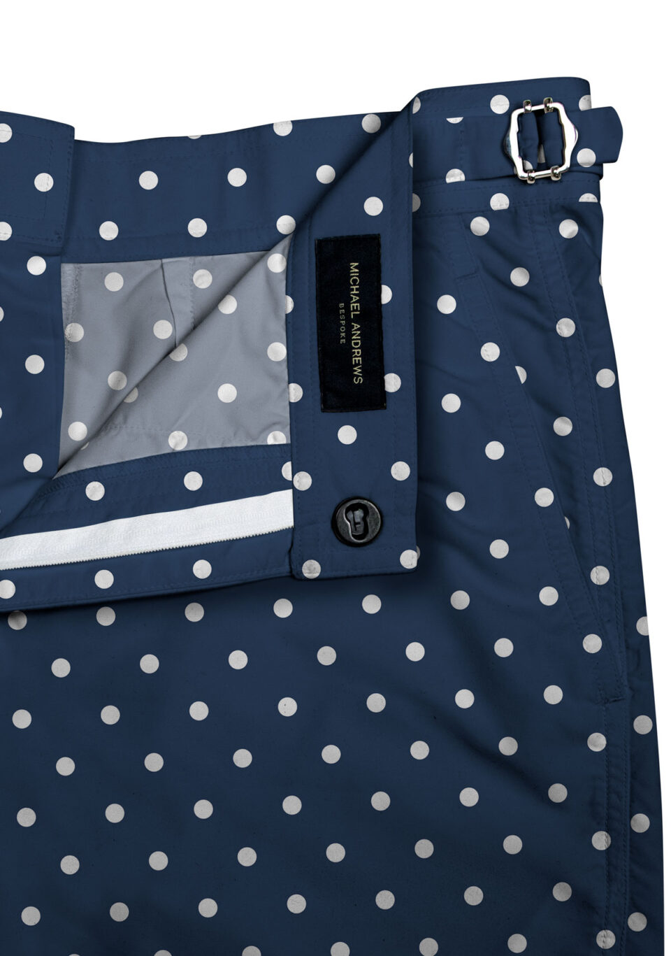 (product) Navy/White Polka Dots Swim Shorts, close-up of waistband details - custom suits nyc bespoke tailor midtown, noho